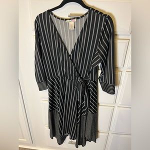 Comfortable black and white striped faux wrap dress